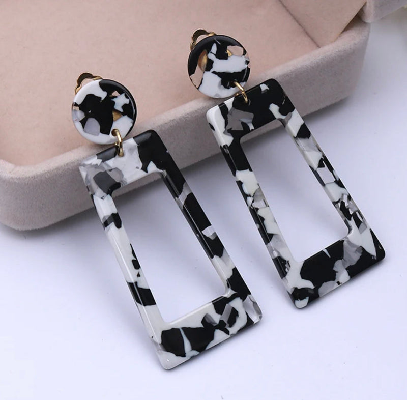 Clip on 2 1/2" plastic silver, black and white long square earrings