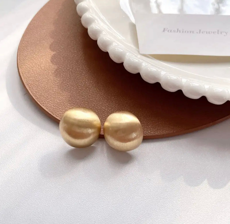 Clip on 3/4" matte gold round dome style earrings