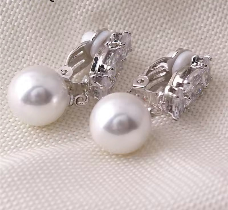 Clip on 1 1/4" silver and clear stone dangle pearl earrings