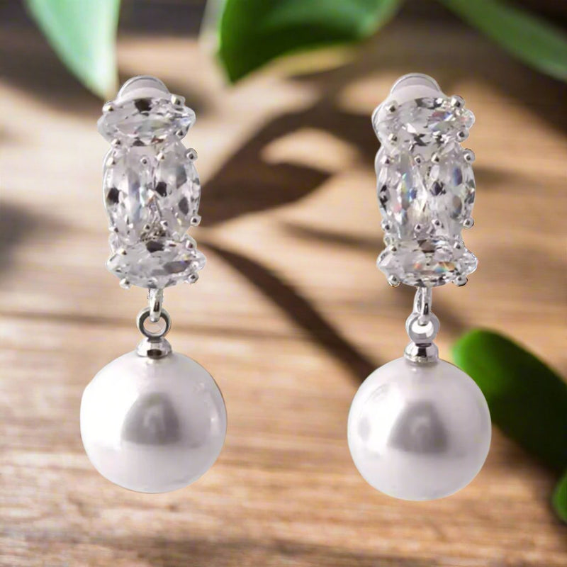 Clip on 1 1/4" silver and clear stone dangle pearl earrings