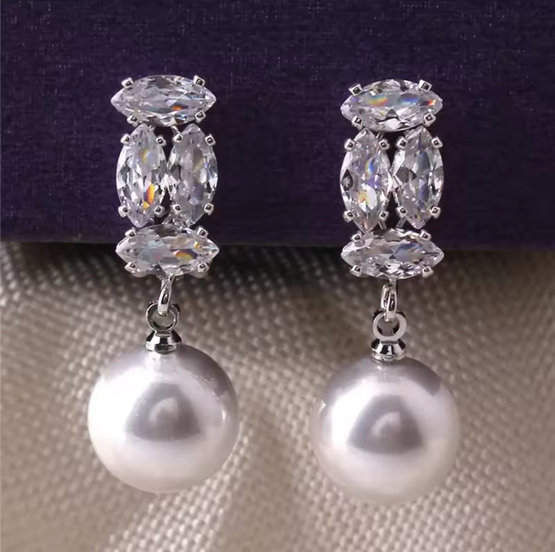 Clip on 1 1/4" silver and clear stone dangle pearl earrings