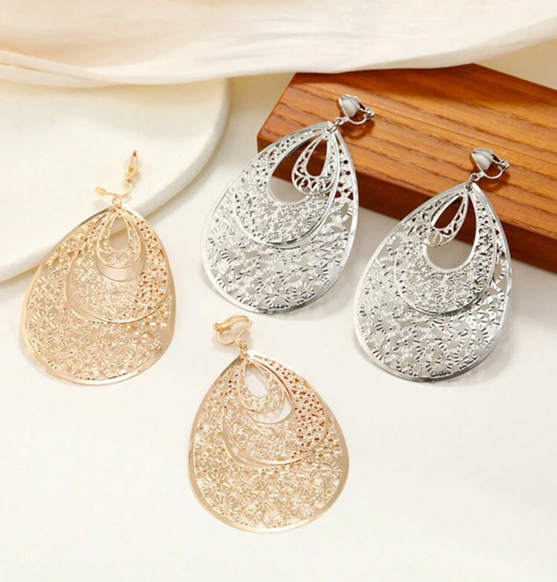 Clip on 3 1/4" silver lightweight layered cutout teardrop dangle earrings