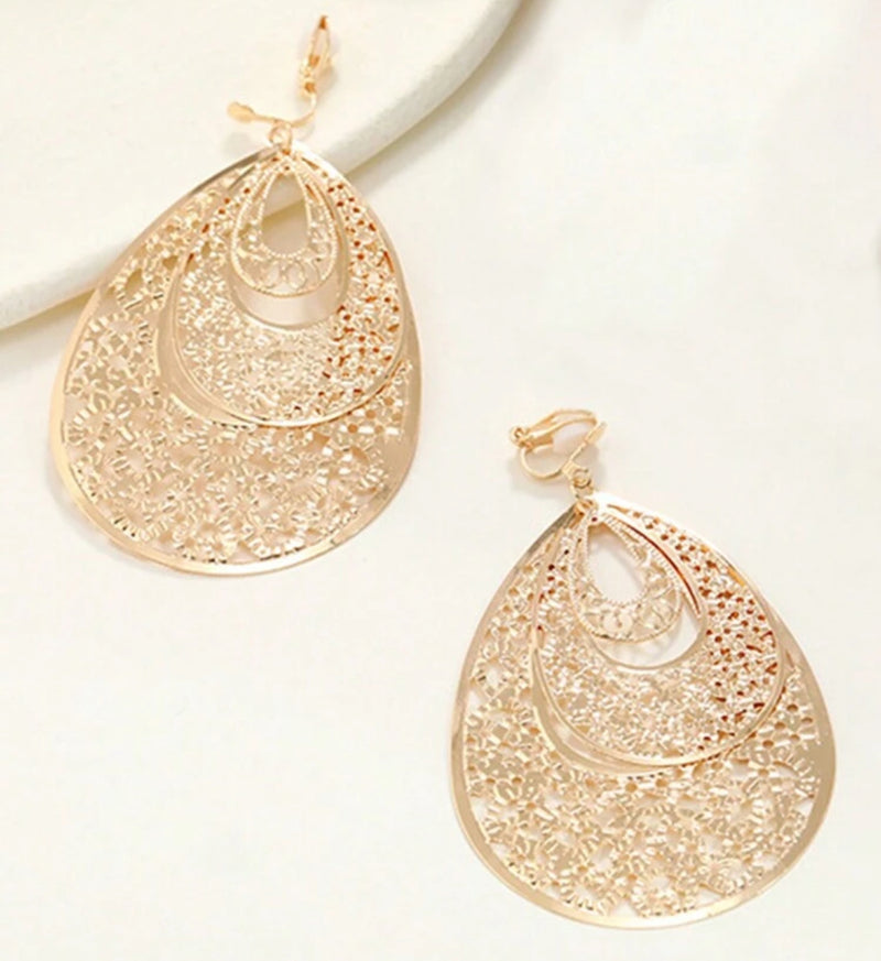 Clip on 3 1/4" gold lightweight layered cutout teardrop dangle earrings