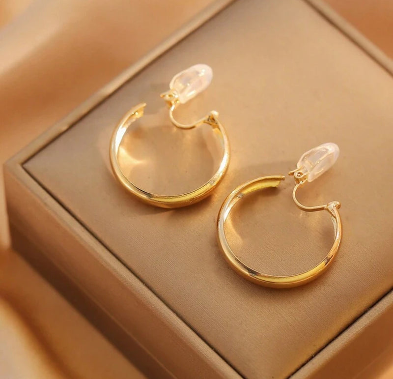 Trendy 1 1/4" clip on shiny gold hoop earring