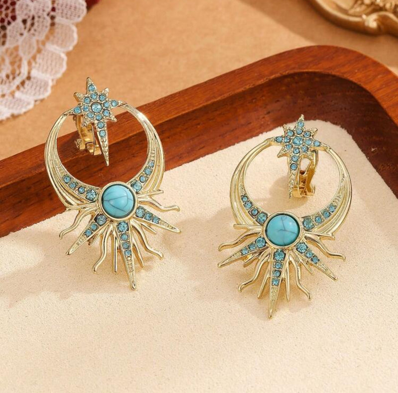 Clip on 1 3/4" gold and turquoise stone starburst earrings