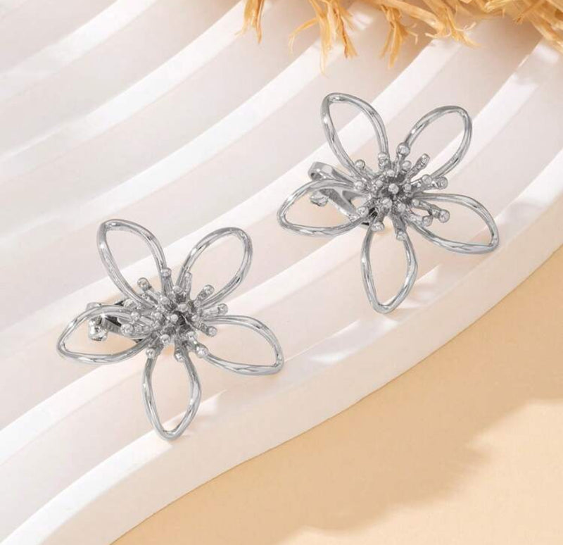 Clip on 1 1/4" silver cutout wire flower button style earrings