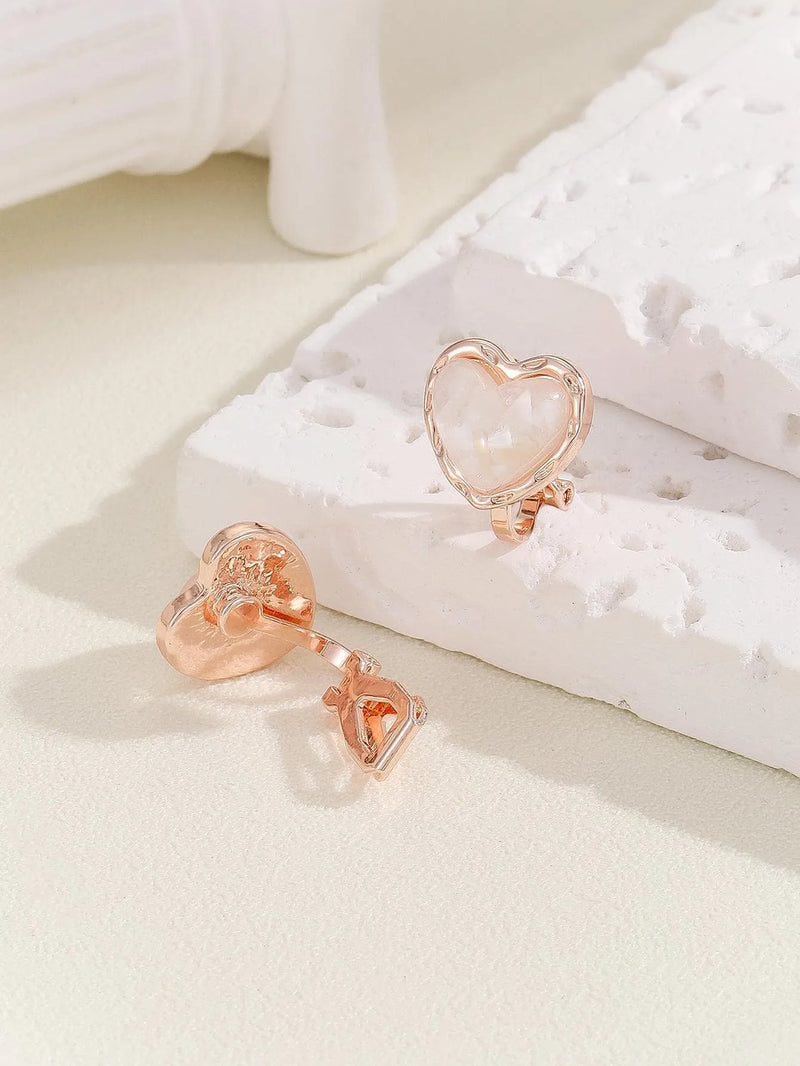 Clip on 1/2" small rose gold and white sparkle heart earrings