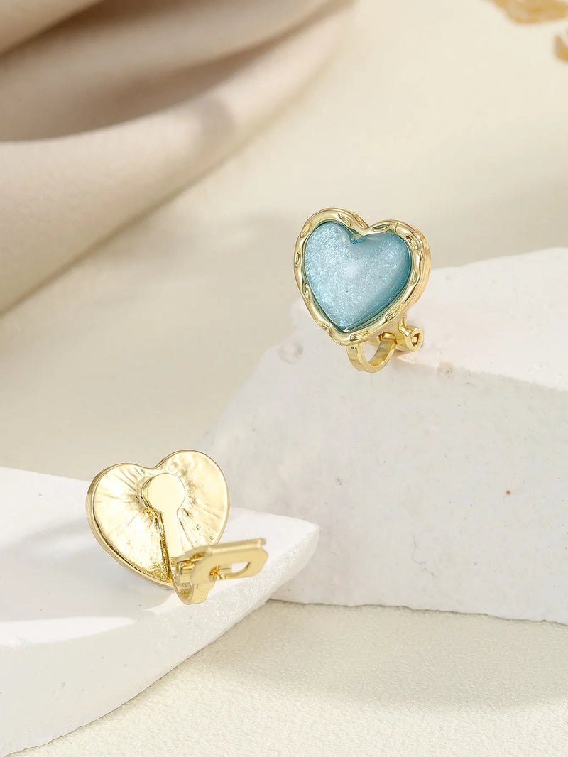 Clip on 1/2" small gold and blue sparkle heart earrings