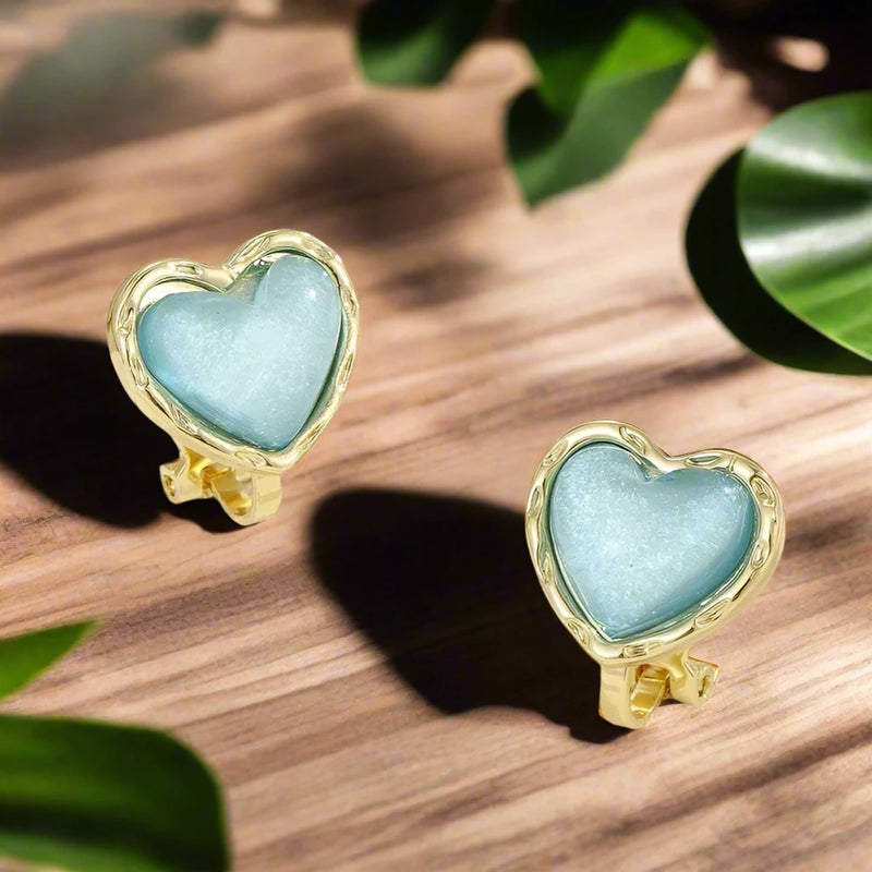 Clip on 1/2" small gold and blue sparkle heart earrings