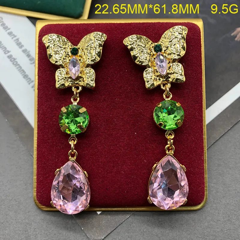 Vintage clip on 2 1/2" gold butterfly green and pink dangle earrings