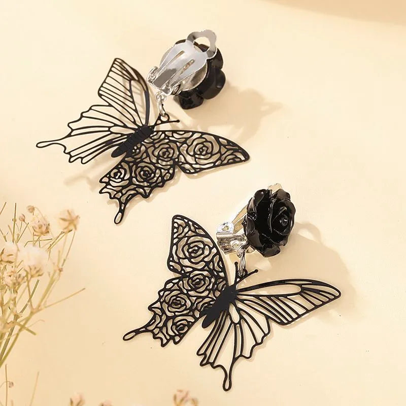 Clip on 2" silver lightweight black flower and butterfly dangle earrings