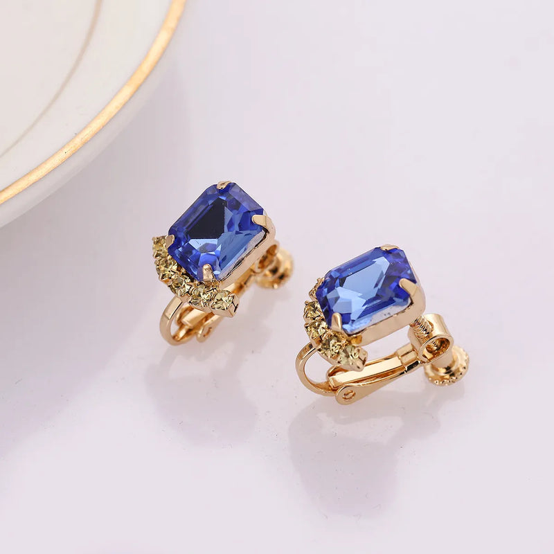 Clip on small gold, blue and clear stone square earrings