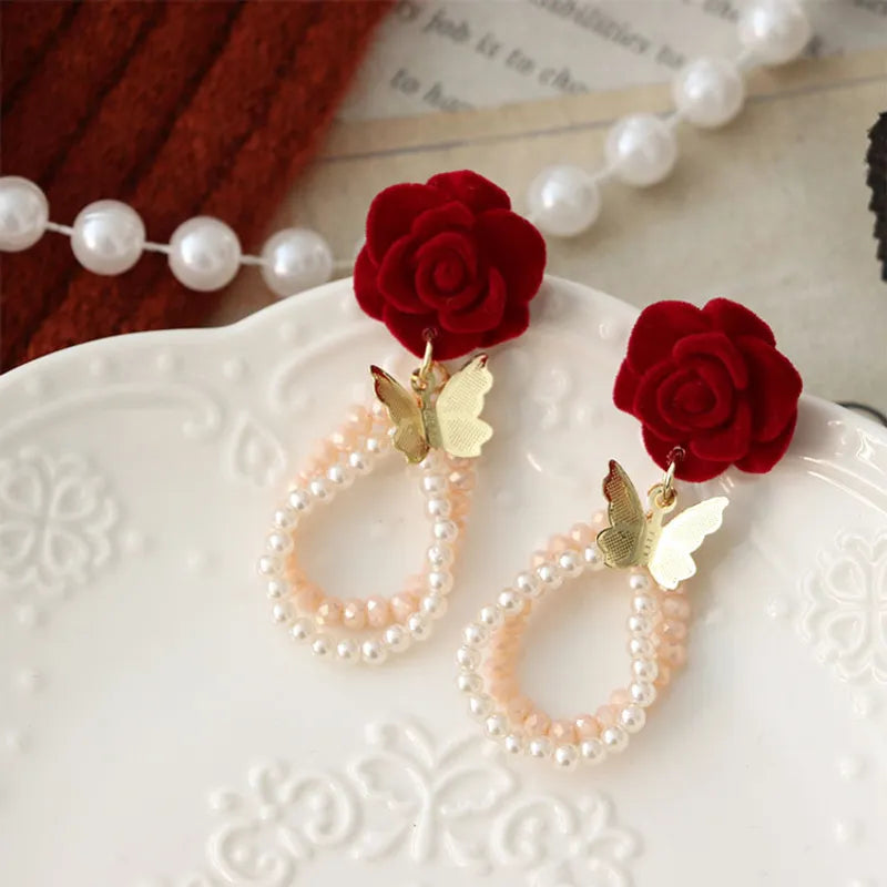 Clip on comfort fit 2 1/4" gold butterfly, red velvet flower earrings w/pearls & beads