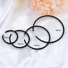 1 pair of clip on silver & black twisted hoop earrings in a variety of sizes