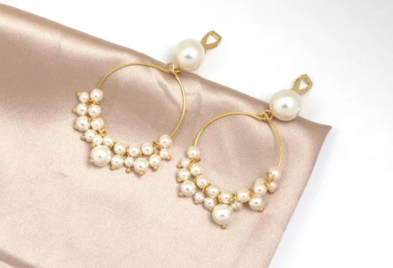 Clip on 2 1/2" gold wire hoop earrings with white pearls
