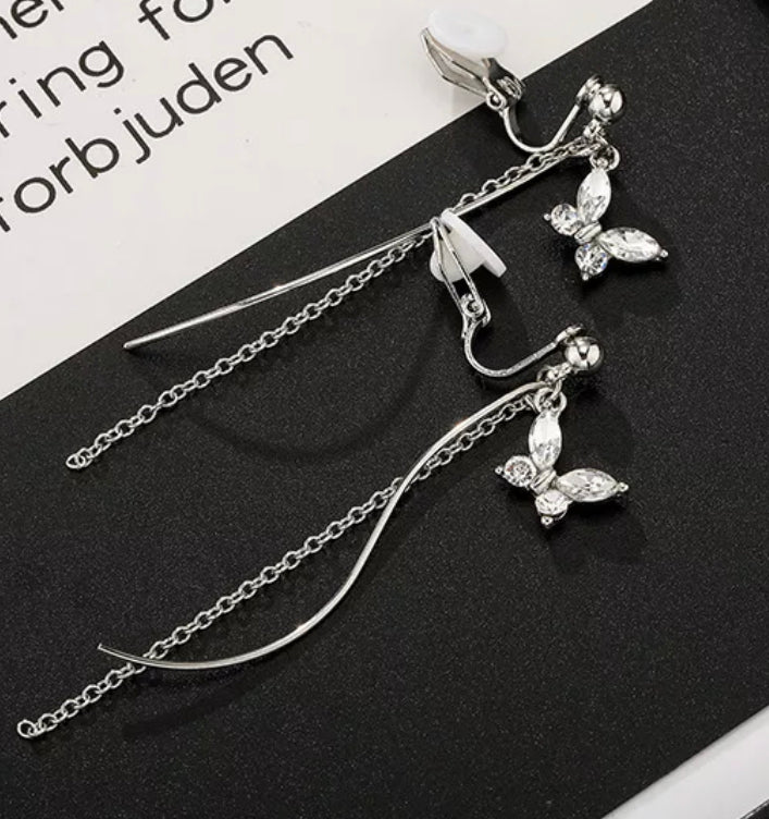 Clip on 2 3/4" silver chain & wire clear stone dangle butterfly earrings