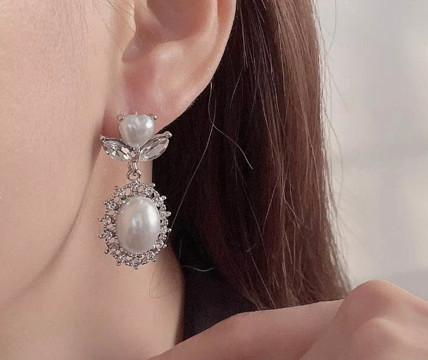 Clip on 1 1/2" silver & white heart pearl earrings w/clear stones