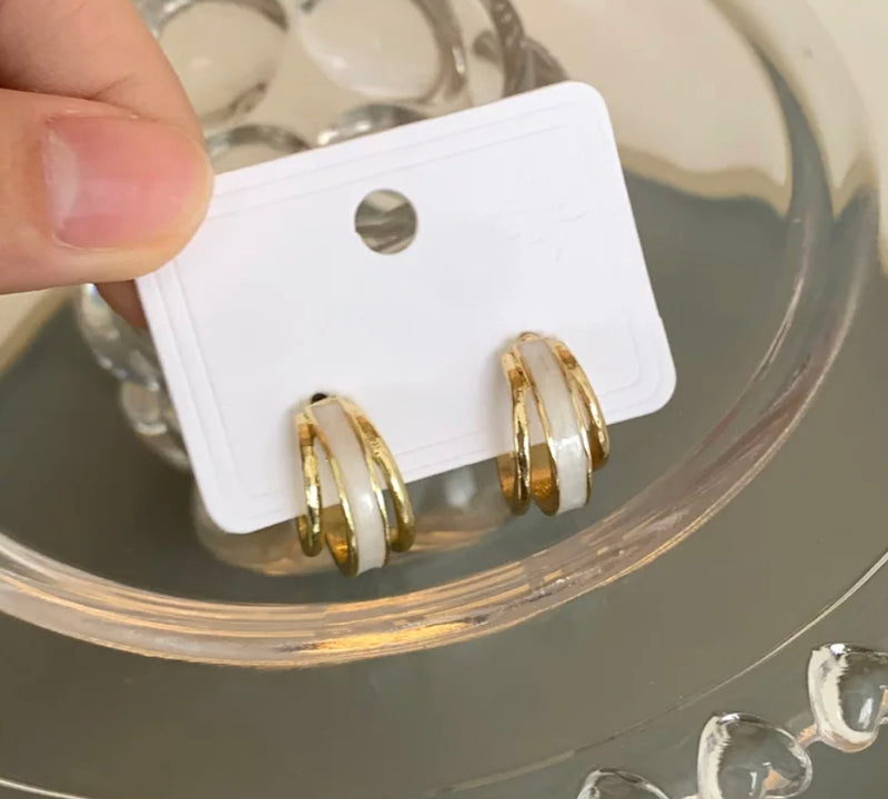 Clip on 3/4" small gold and white cutout hoop earrings