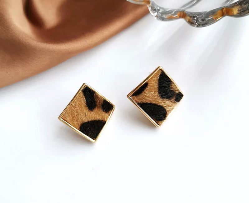 Clip on 1" gold and brown hairy animal print bent square button style earrings