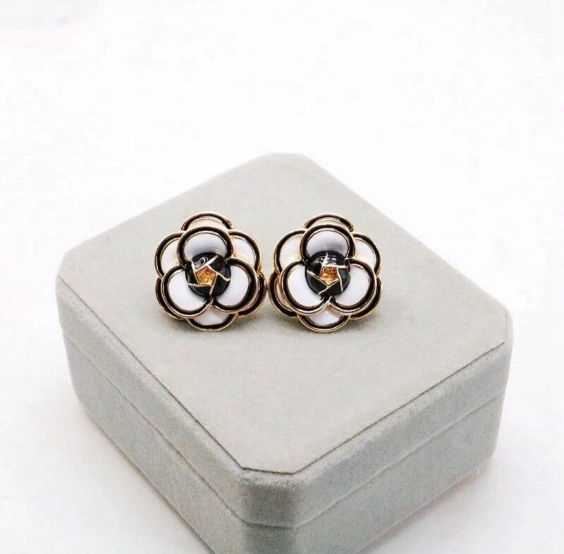 Clip on 1" gold, black and white flower button style earrings