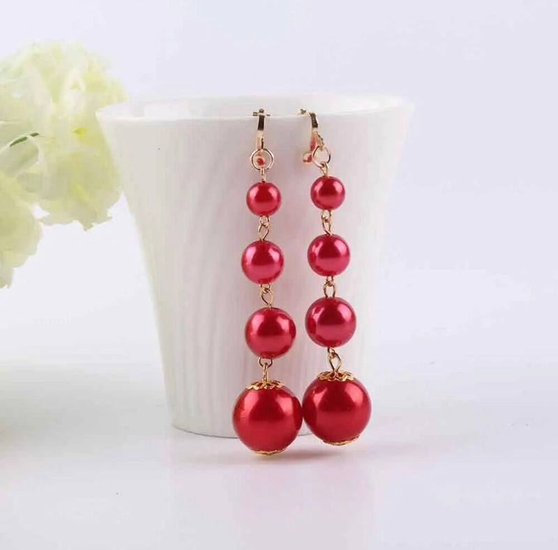 Clip on 3" gold and red pearl graduated dangle bead earrings