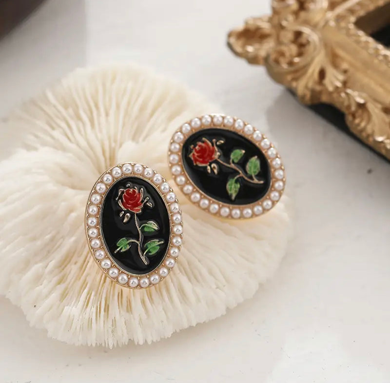 Clip on 1" gold and black red rose oval earrings w/white pearl edges