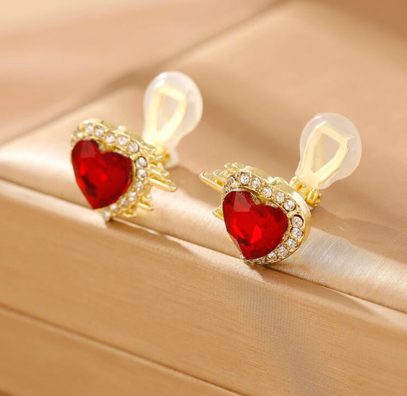 Clip on 1/2" gold spike, red & clear stone heart button style earrings