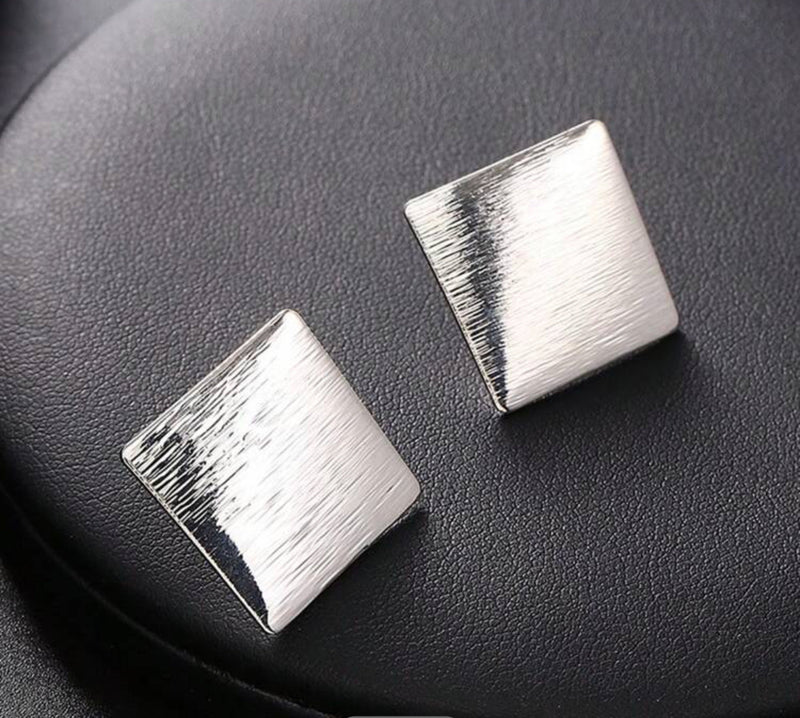 Clip on 1" silver textured square button style earrings