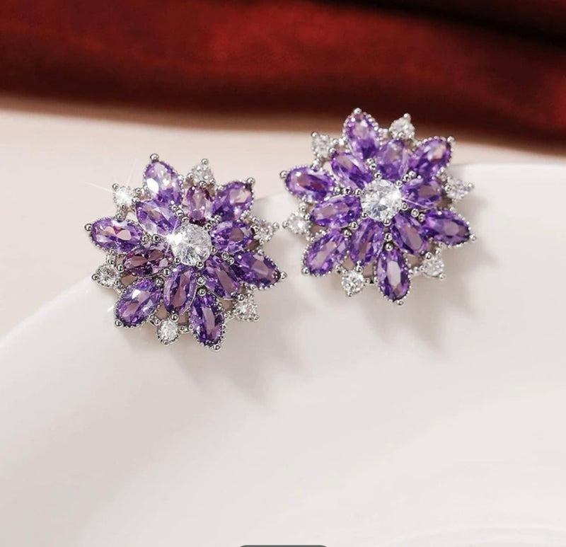 Pierced 3/4" silver & purple stone pointed edge starburst earrings