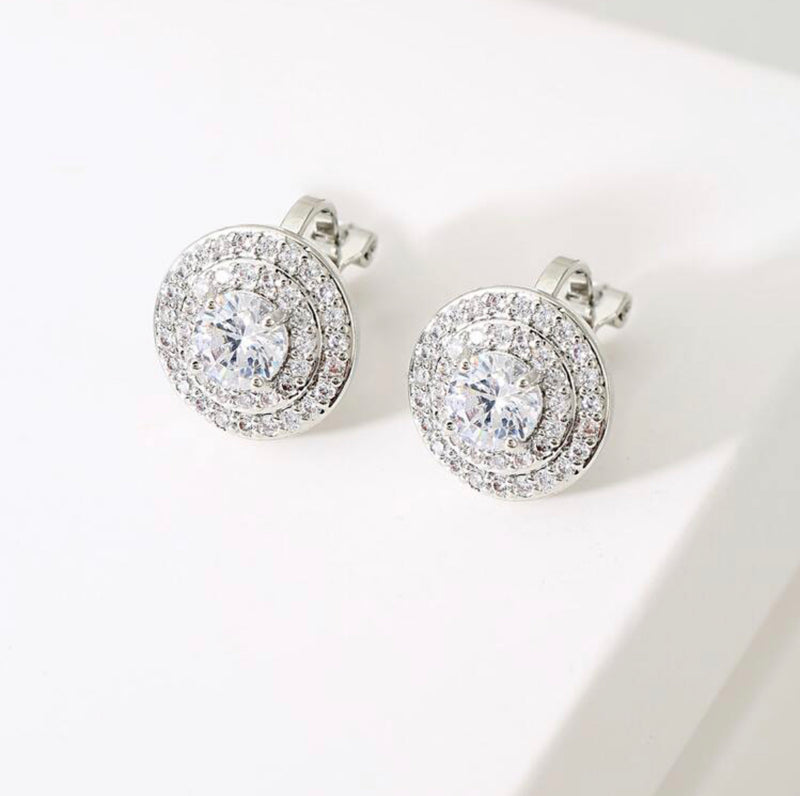 Clip on 3/4" silver and clear stone round button style earrings