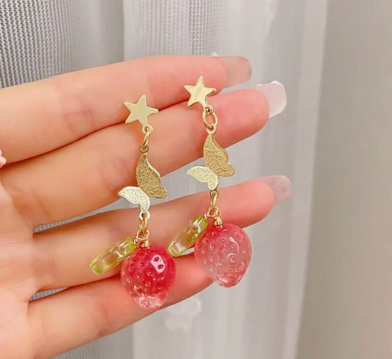 Clip on 2 1/4" gold butterfly earrings with red strawberry and green leaf