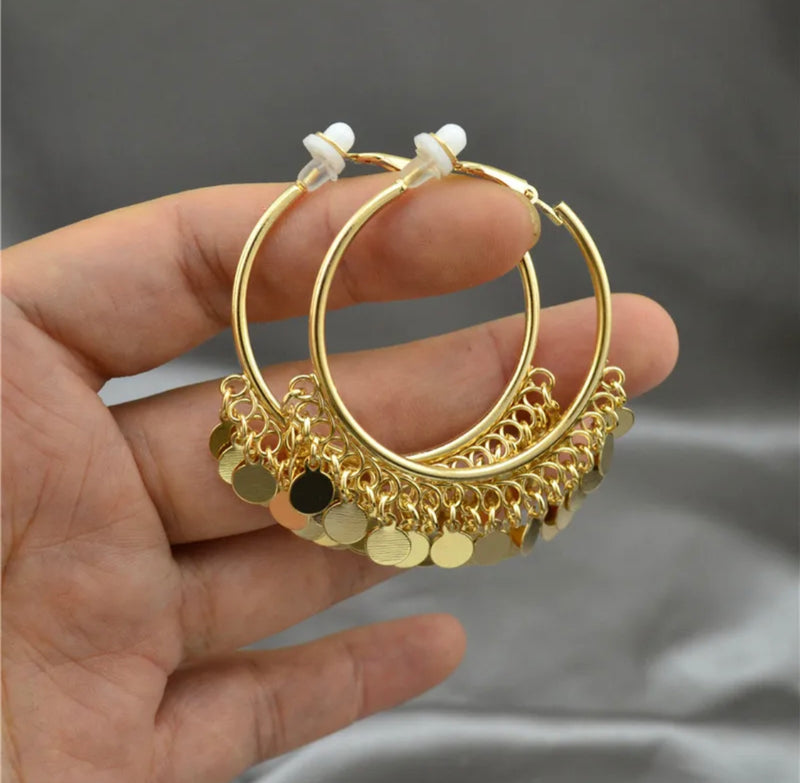 Clip on 1 1/2" gold hoop earrings with dangle round circles