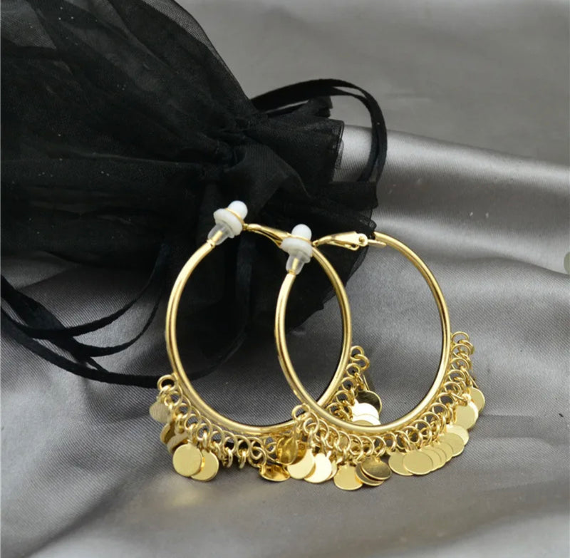 Clip on 1 1/2" gold hoop earrings with dangle round circles