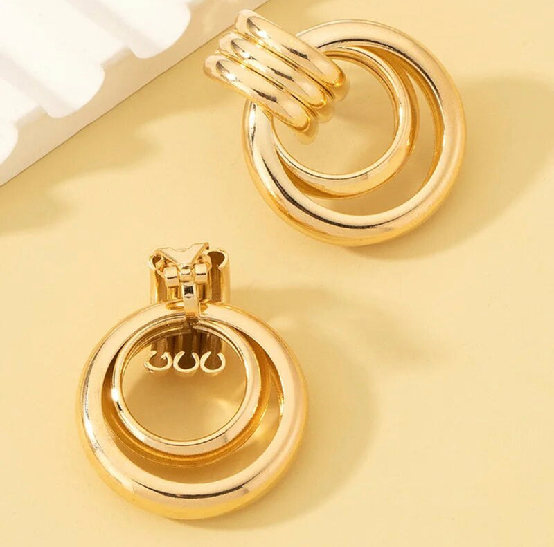 Clip on 1 1/4" shiny gold double hoop doorknob earrings
