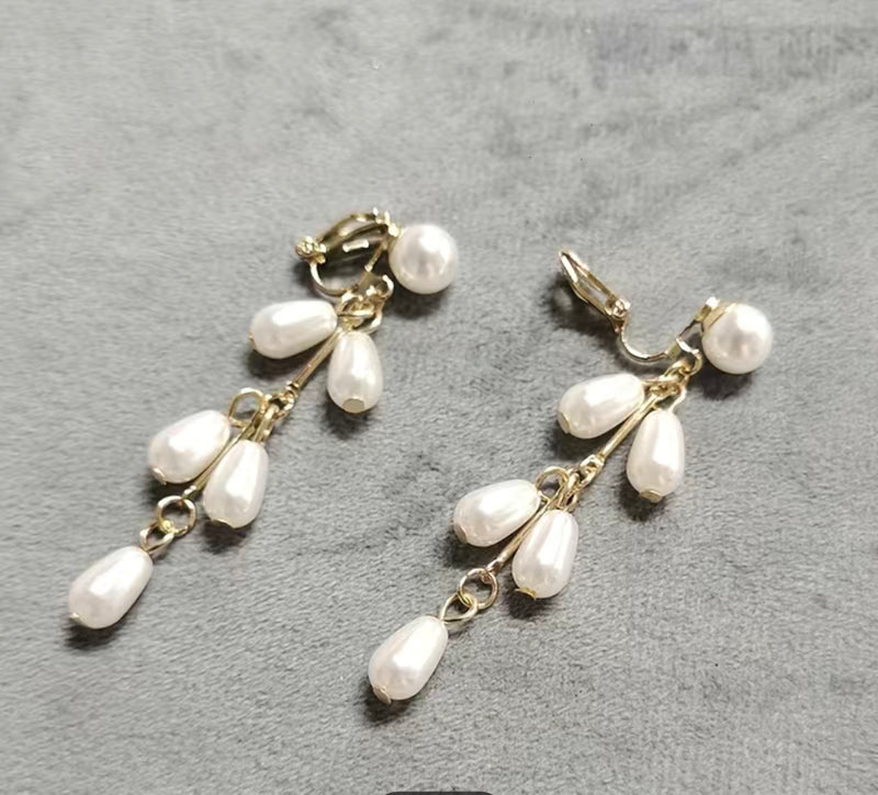 Clip on 2 1/2" gold bar and white pearl dangle earrings