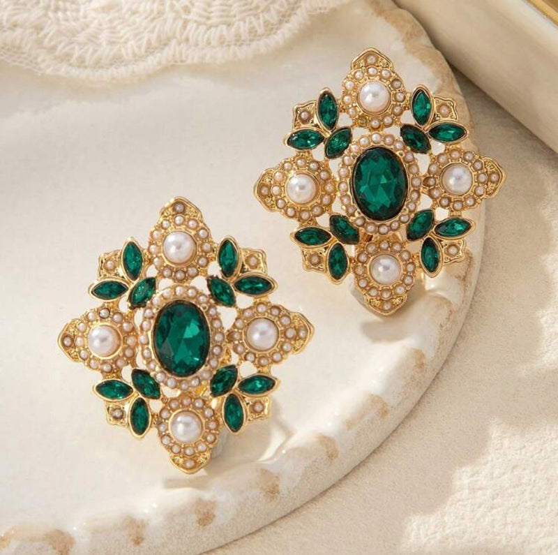 Vintage clip on 1" gold, black and white swirl button style earrings