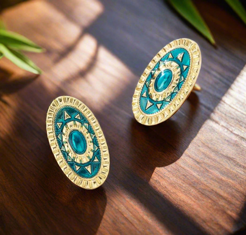 Clip on 1 1/4" gold and turquoise print skinny oval button style earrings