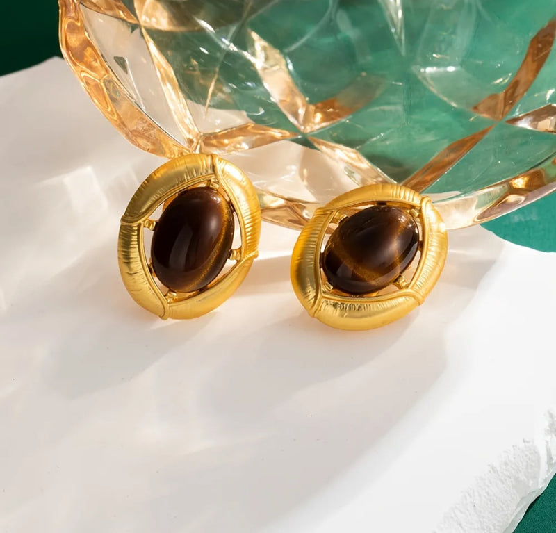 Vintage clip on 1" gold, black and white swirl button style earrings