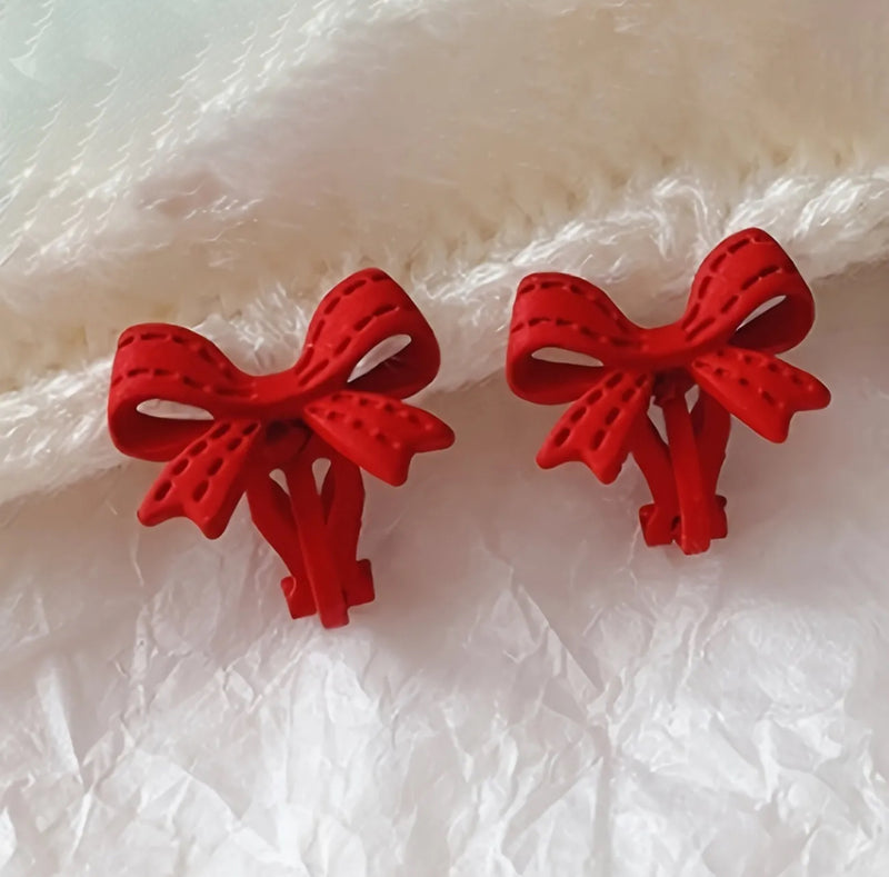 Vintage clip on 1" gold, black and white swirl button style earrings