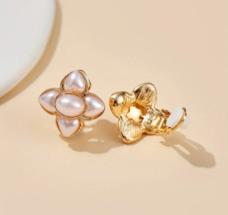 Vintage clip on 1" gold, black and white swirl button style earrings