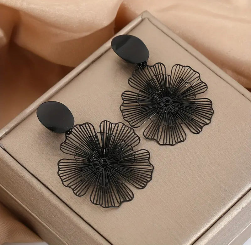 Clip on 2 1/2" lightweight black cutout flower dangle earrings