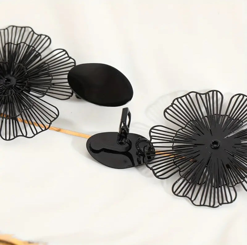 Clip on 2 1/2" lightweight black cutout flower dangle earrings