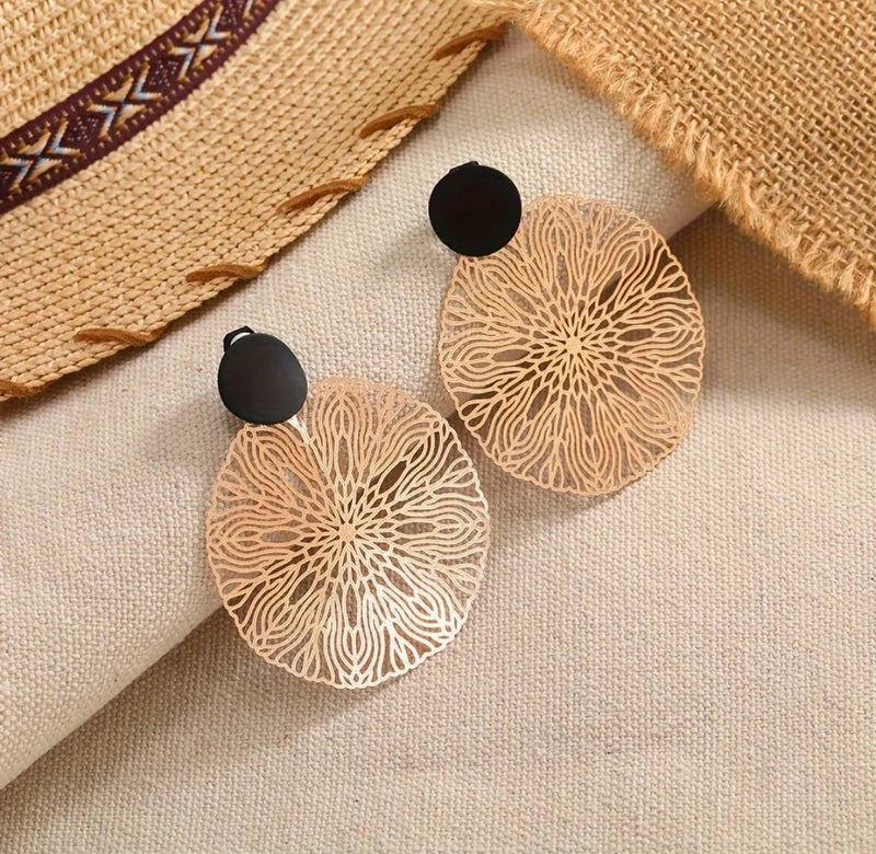 Clip on 2 1/2" lightweight black and gold double circle cutout dangle earrings