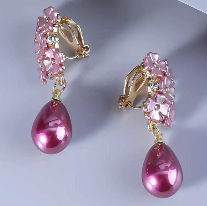 Clip on 1 1/2" gold and pink flower earrings with dangle teardrop