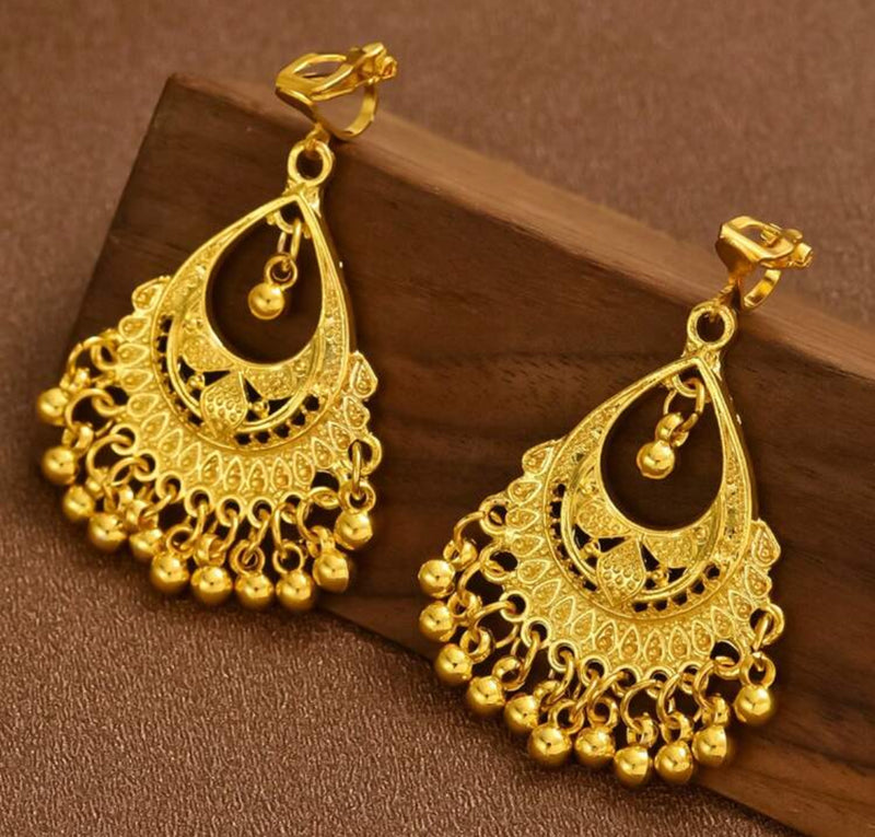 Clip on 2" golden cutout teardrop earrings with dangle balls