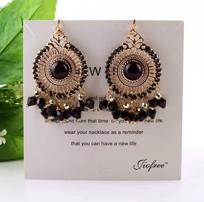 Clip on 3 1/2" cutout circle lightweight gold and black dangle beaded earrings