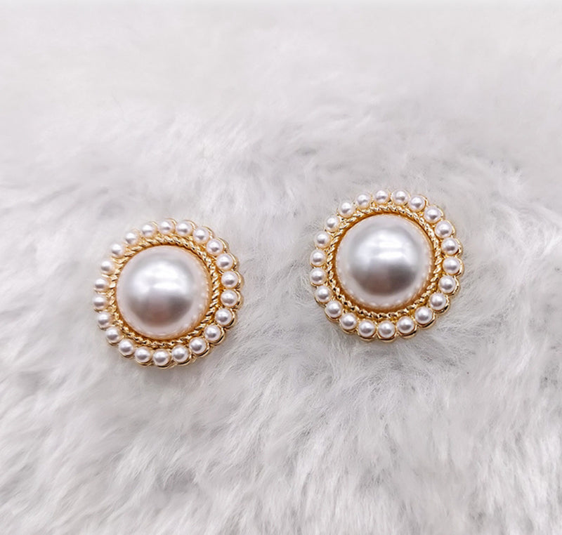 Vintage clip on 1" gold, black and white swirl button style earrings