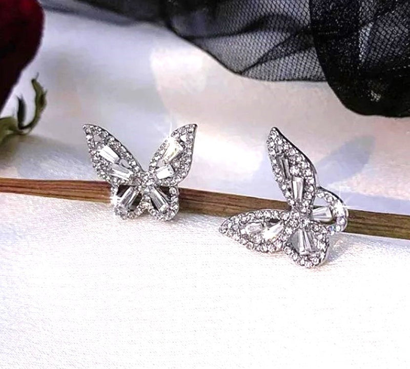 Pierced 3/4" silver clear stone butterfly button style earrings