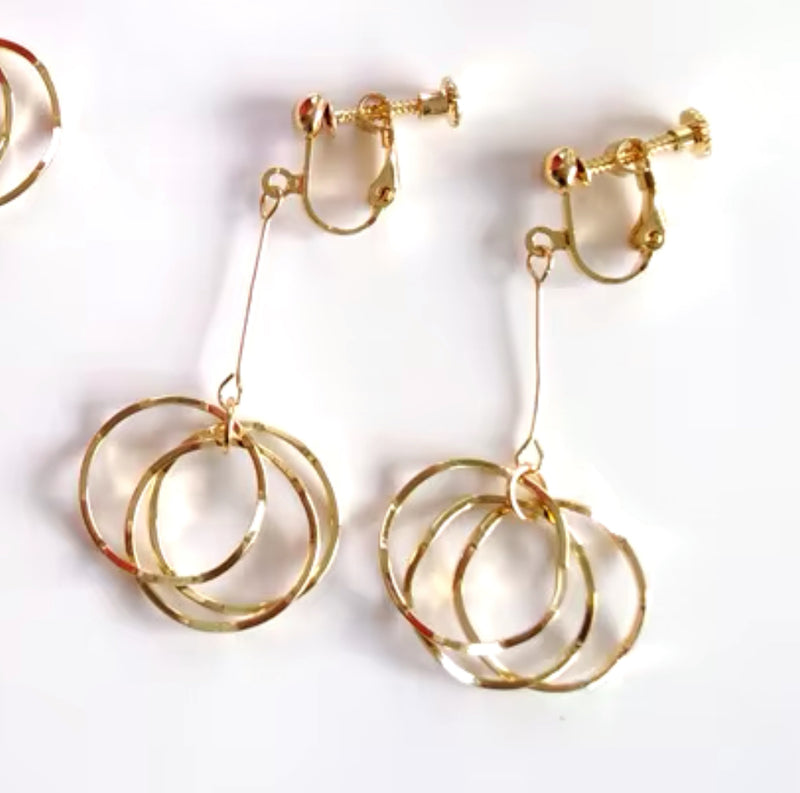 Clip on 2 1/2" gold wire dangle multi bent hoop earrings