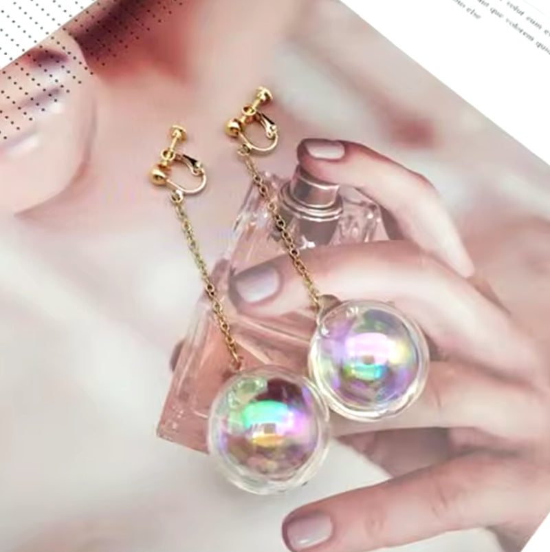 Clip on 3 3/4" long gold chain water filled iridescent dangle ball earrings